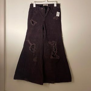Maroon free people distressed corduroy bell bottoms.